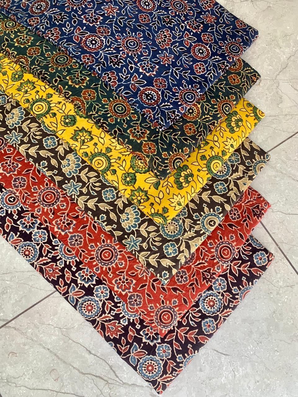 Ajrakh pure cotton handblock printed fabric combining jaal and stripe patterns in traditional colours